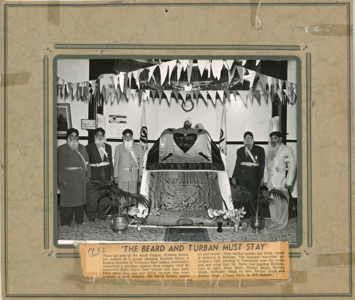 Group photograph of six men at Victoria gurdwara